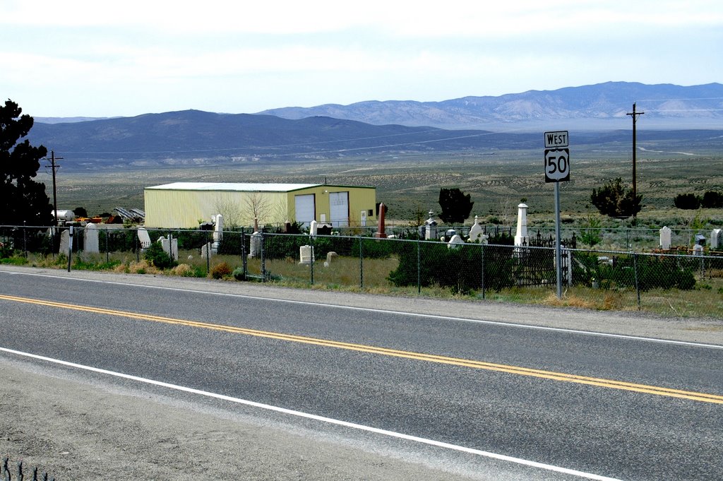 Highway 50, "The Loneliest Road in America", cutting thru the middle of the Austin Nv. graveyard. Elevation 6250 ft.