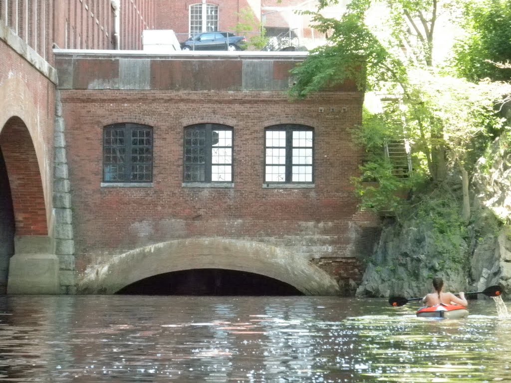 Kayaking Just Over the Waterfall
