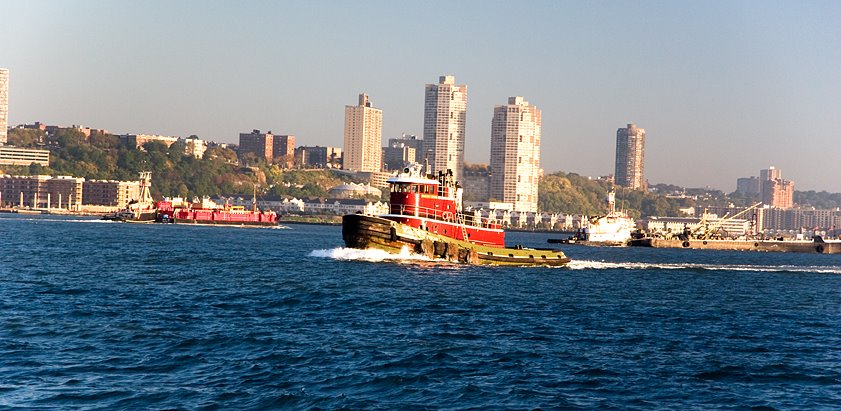 Tug on the Hudson, West New York, NJ behind