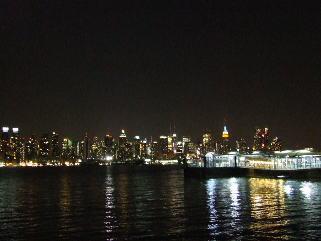 Night time skyline near pass ferry