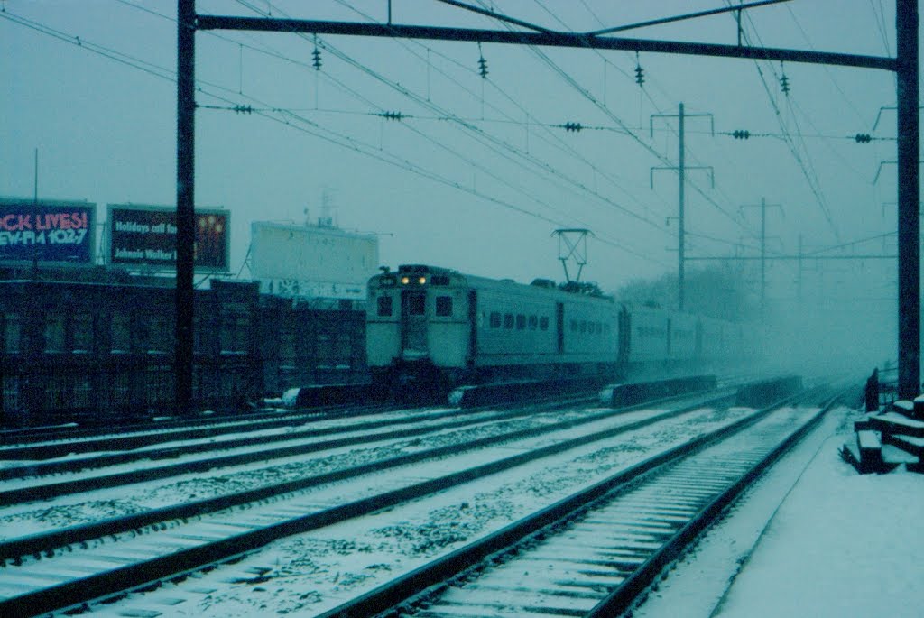 Southbound New Jersey Department of Transportation Commuter Train, with Arrow III MU Cab Control Car No. 1461 in the lead, approaches the Station at Elizabeth, NJ