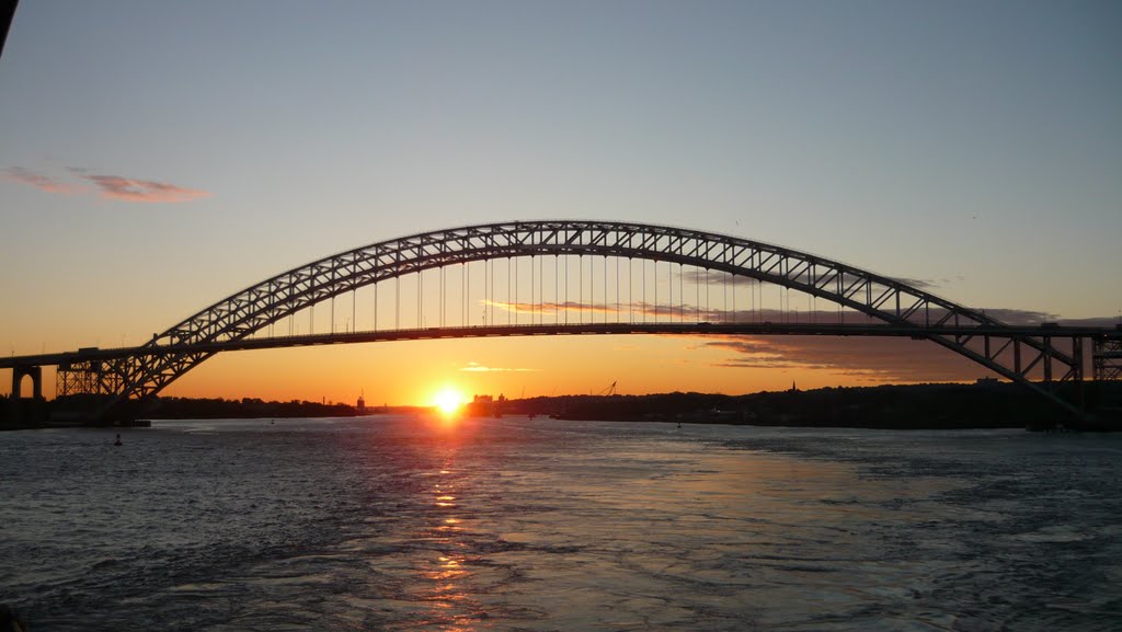 Sun behind Bayonne Bridge