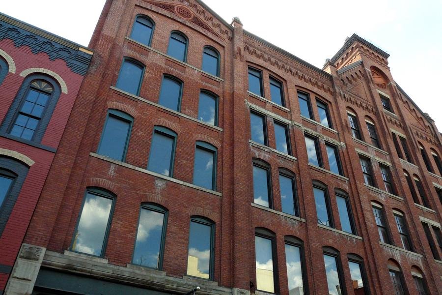 copyrighted__  Clouds in Windows of Old Brick Buildings