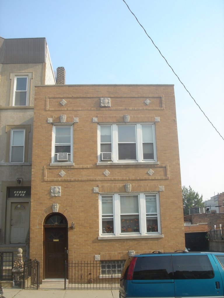 House on 38th St between Broadway and 34th Ave in Astoria facing southwest on October 17, 2007
