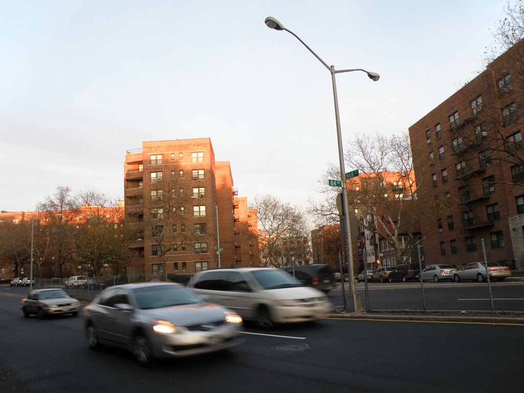 The Sun Beginning To Set At Apartment Buildings In Briarwood, New York, USA.