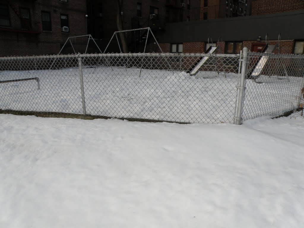The Playgrond round the corner of my house covered with snow.