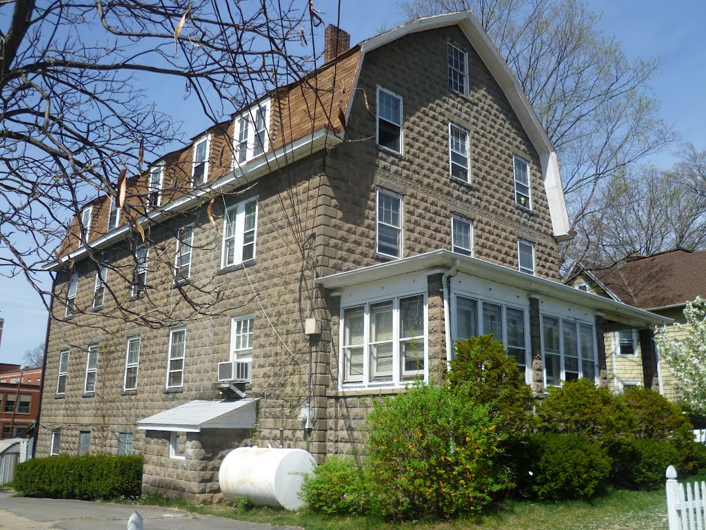 concrete "Roman stone" boarding house with gambrel roof