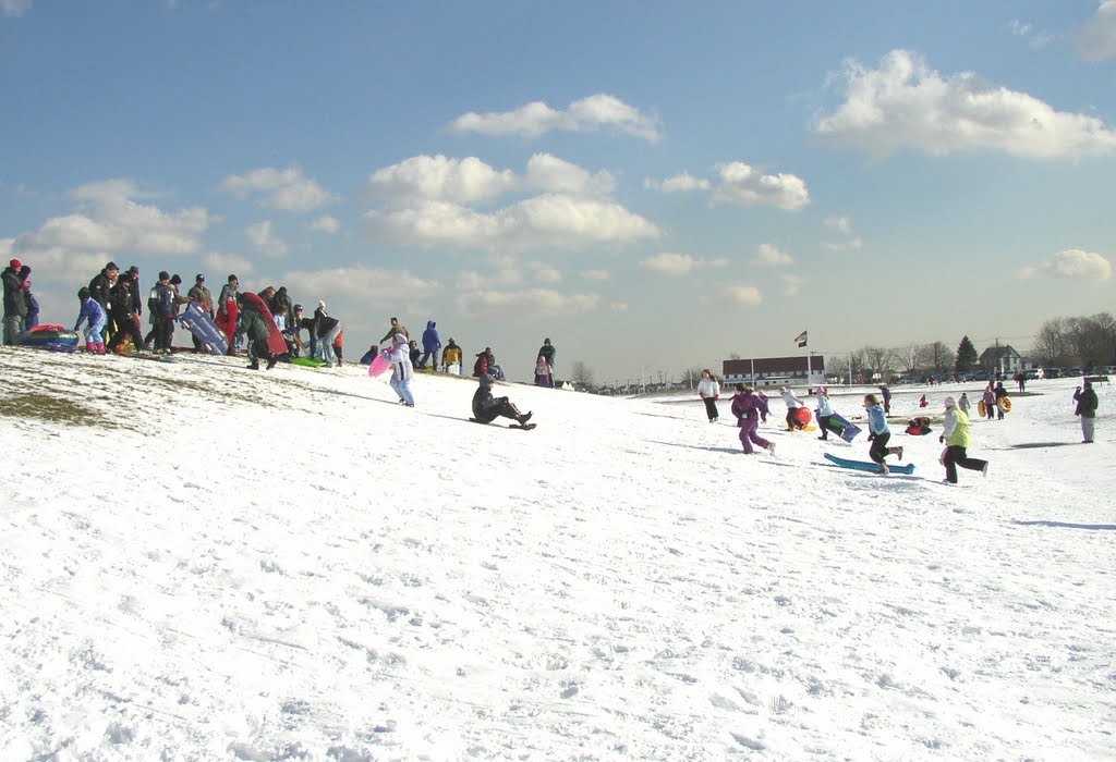Winter fun at the Wedges play knoll.