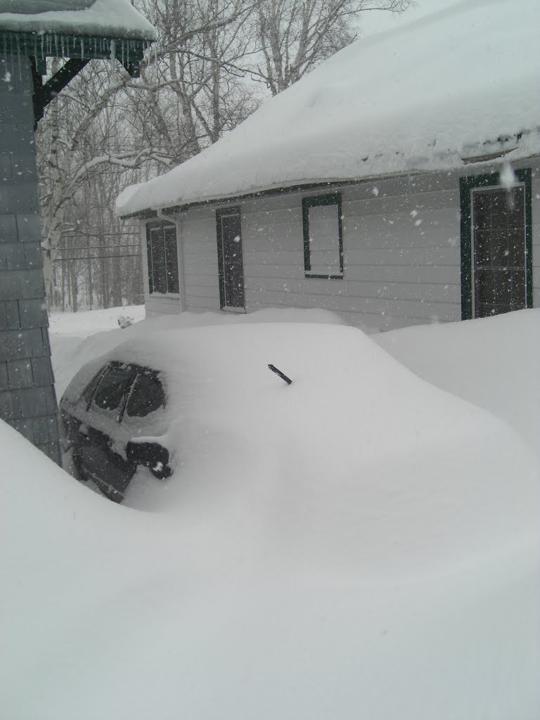 Spring snow storm - 30 inches fresh snow.  Our Volvo, buried! Saranac Lake, march 7, 2011.