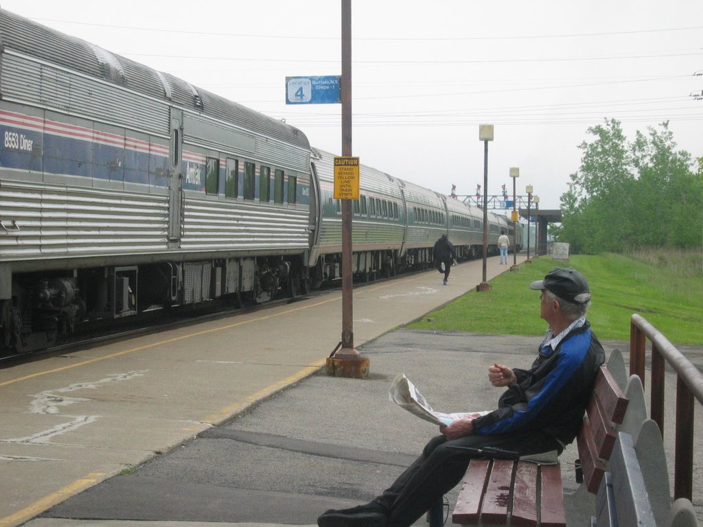 Passengers Boarding An Amtrak Train At Buffalo-Depew Station