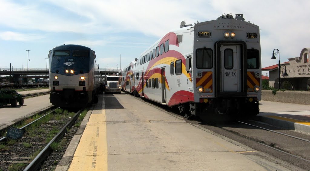 Rail Runner pulling up alongside Amtrak.