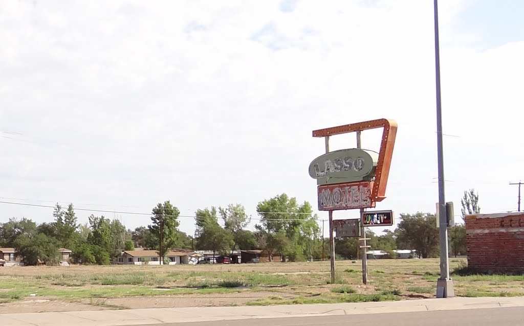 A sign for a motel long gone.