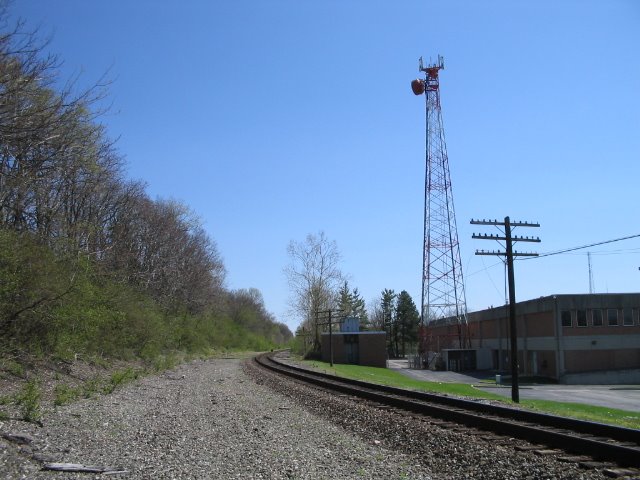 Radio tower and tracks headed south