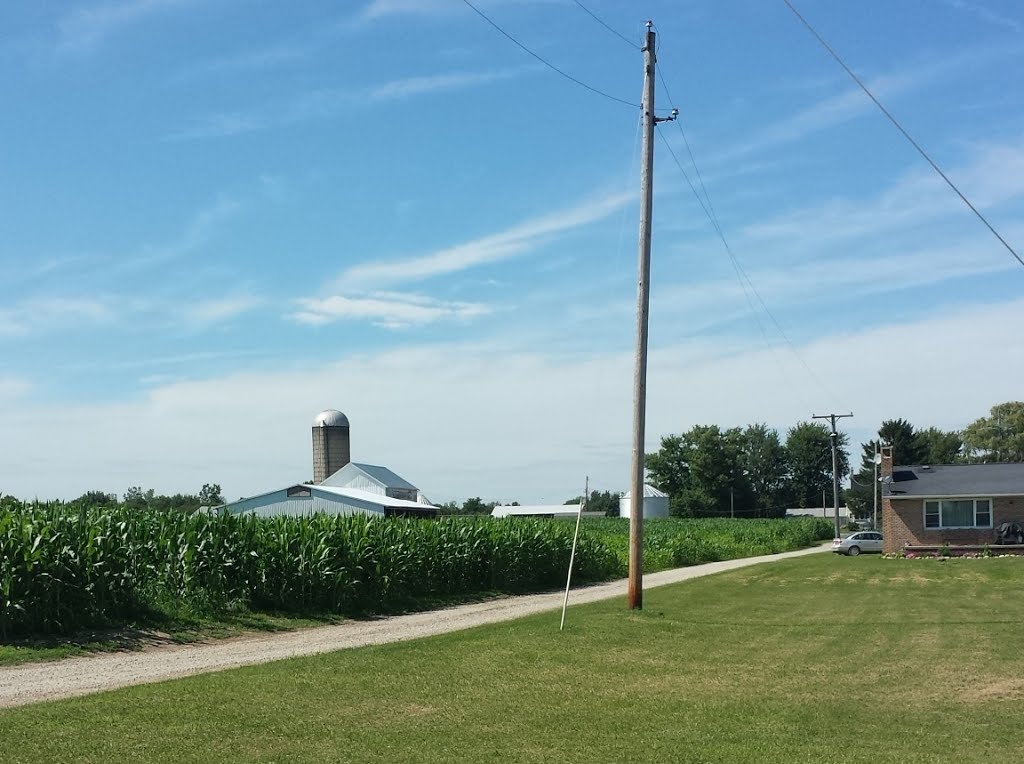 Corn and silo, must be a farm.