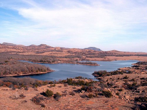 Taken from on top of Little Baldy mountain, this is a picture of Lake Quannah Parker in the Wichita Mountains National Wildlife Refuge (US)
