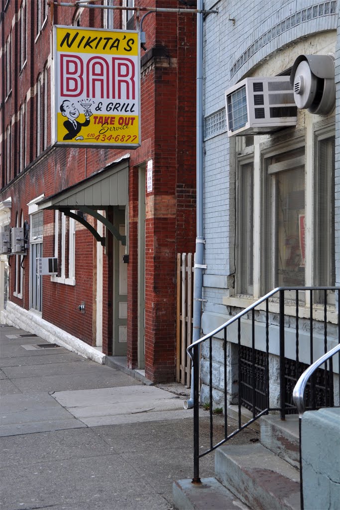 Nikitas Bar & Grill sign