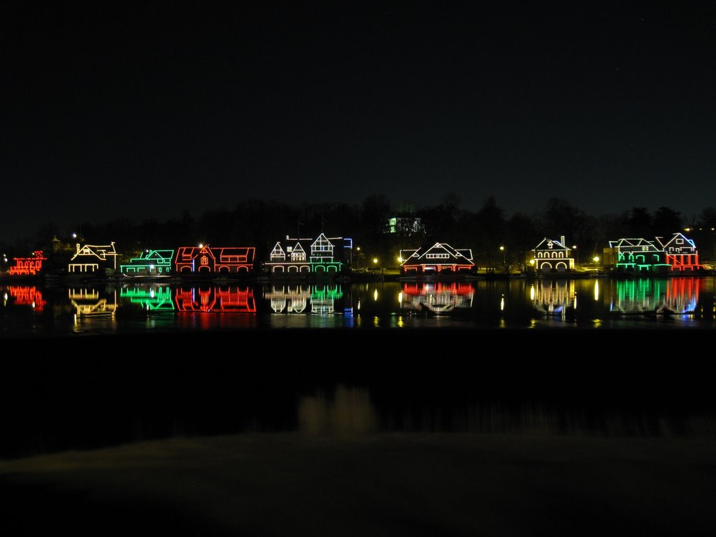 Boat house row at night with xmas lights
