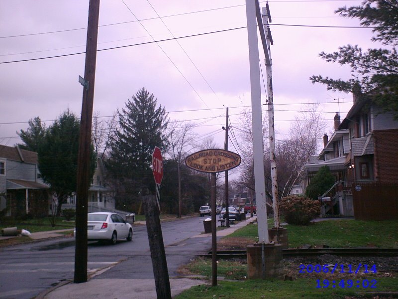 Corner of Woodlawn Ave and Andrews Ave, at the trolly tracks crossing