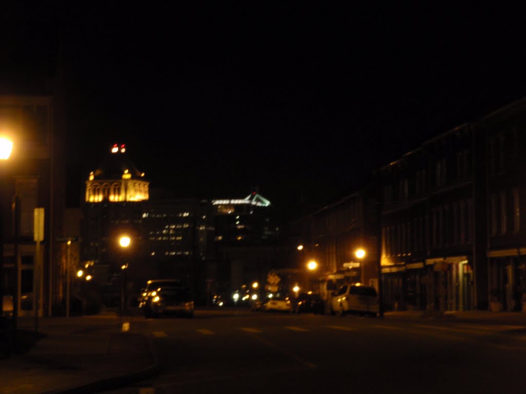 nighttime street scene looking up Martin Luther King, Jr. Drive in Southside Greensboro towards downtown, 1-13-10