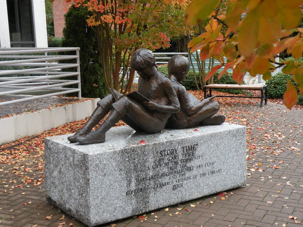 "Story Time" statue in front of Library in Concord N.C.