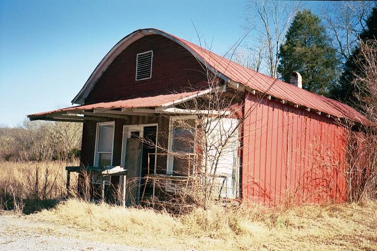 Little Red Round Roof store Near Alexandria Tn . Since demolished. Exact location seems to be under current road right of way.