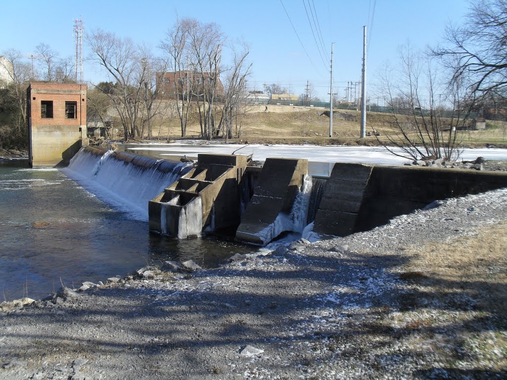 Fishermans Park in Winter with frozen Duck River above Dam
