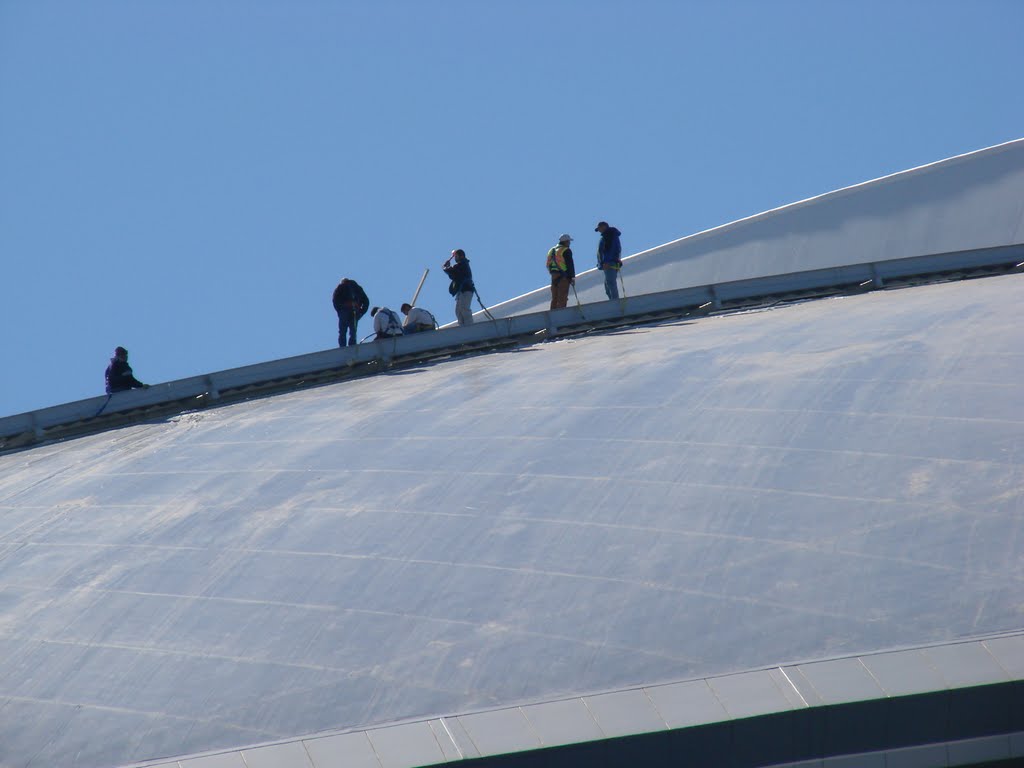 Snow Removal Crew on Stadium Roof
