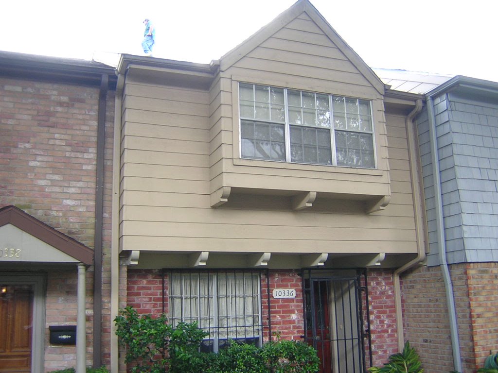 West Belt Townhomes Association - Siding and Window Leak Repair