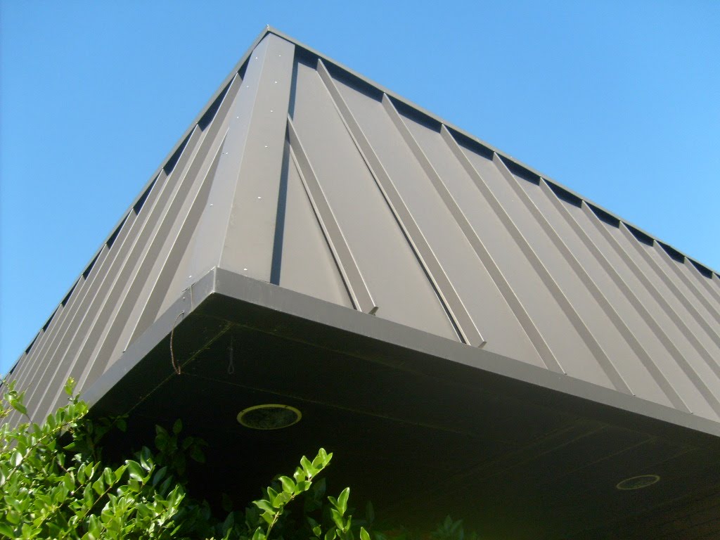 Metal Roof Repairs to Optometry Practice on Broadway in Pearland Texas