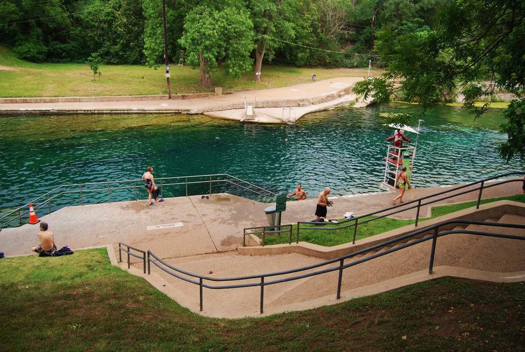 Barton Spring swimming pool, Austin, TX.  The pool is fed by a karst spring which brings water to the surface from the Edwards aquifer.  The cool waters of the park are a center piece of life in Austin.