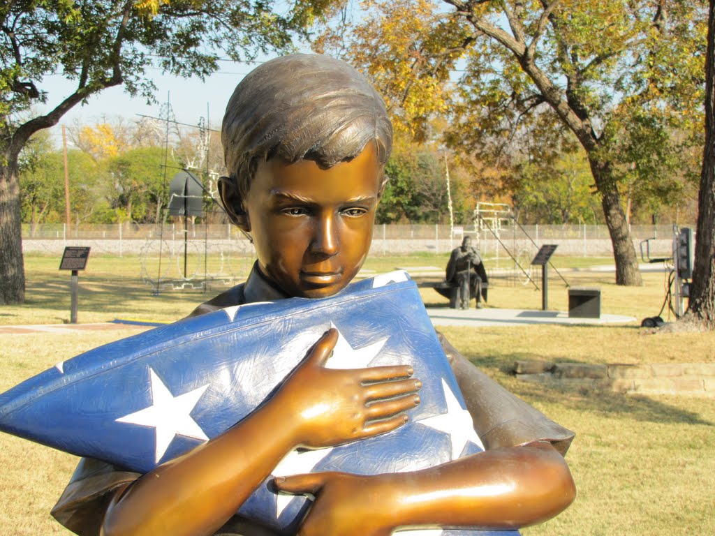 Bronze Sculpture of boy with US flag at Liberty Plaza