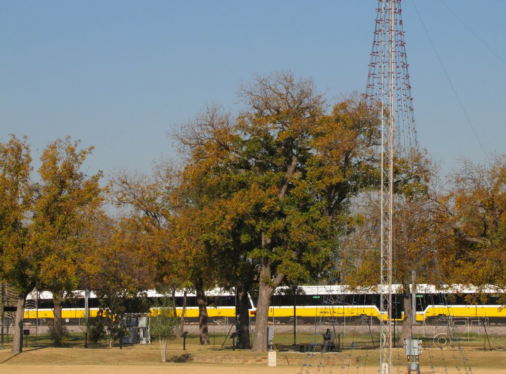 DART train darting thru the fields at Farmers Branch (between Jeff Fuller Rose Garden and Liberty Plaza)