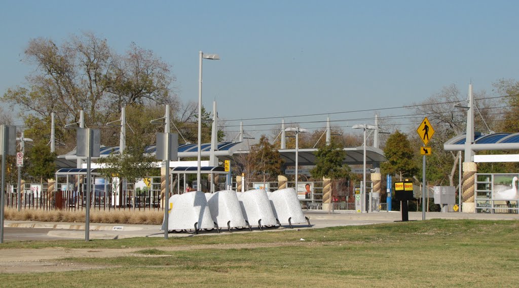 Farmers Branch Light Rail (DART) Station with Bicycle Parking Pods and Free Car Parking (237 Spaces, but not overnight). Stop for Dr Pepper StarCenter, Farmers Branch City Hall, Watterworth Park, Historical Park