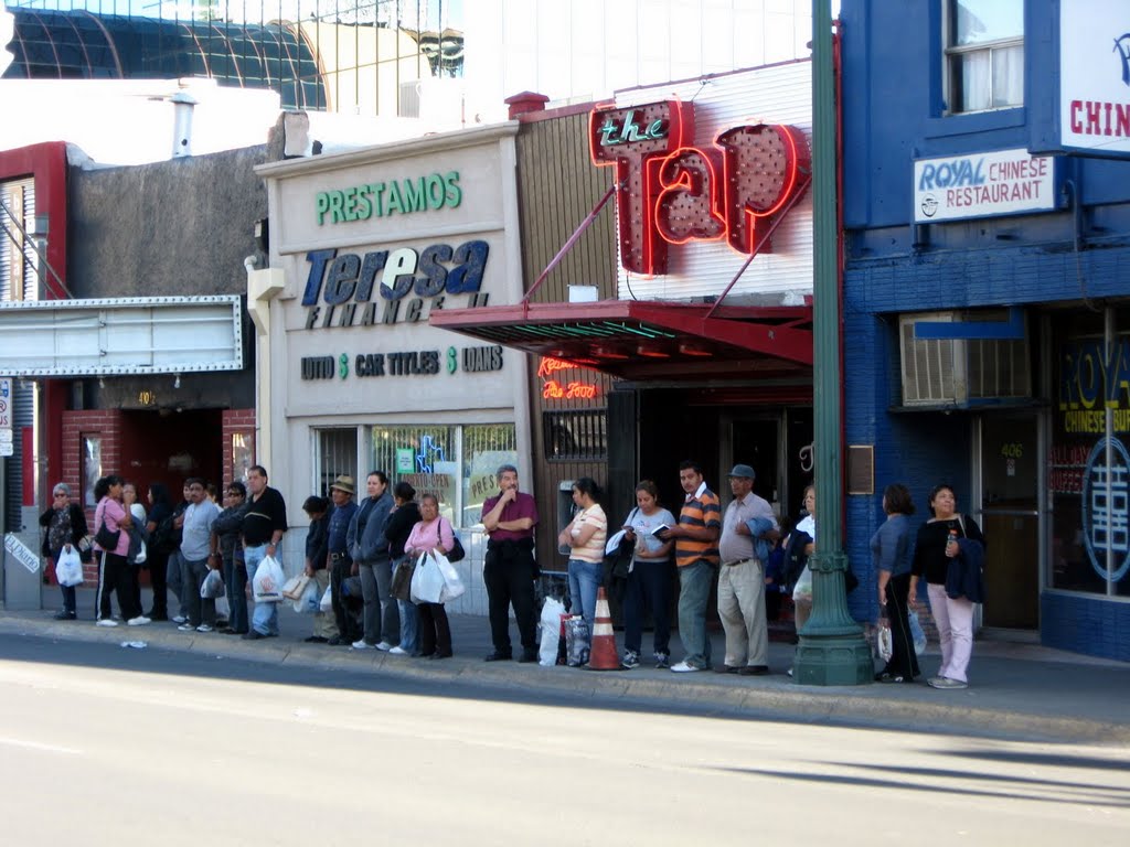 Waiting for the bus outside The Tap.