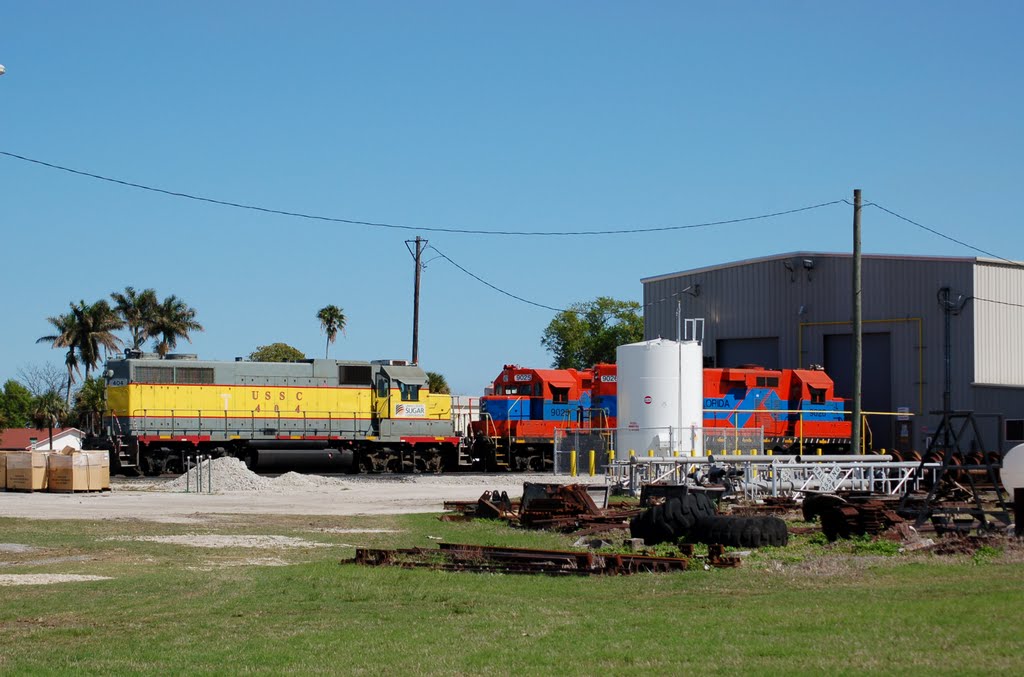 United States Sugar Corporation EMD GP38AC No. 404, South Central Florida Express Railroad EMD GP18 No. 9025 and No. 9026 at Clewiston, FL