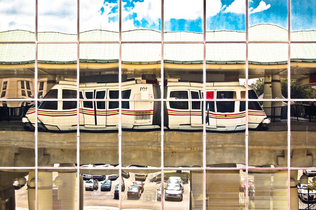 Sightseeing Train Reflecting of a Buildings Windows