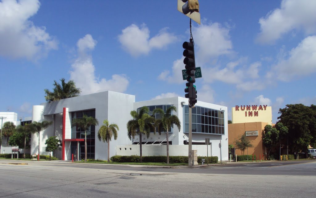 Office Building and Runway Inn Motel off NW 36th St & East Dr