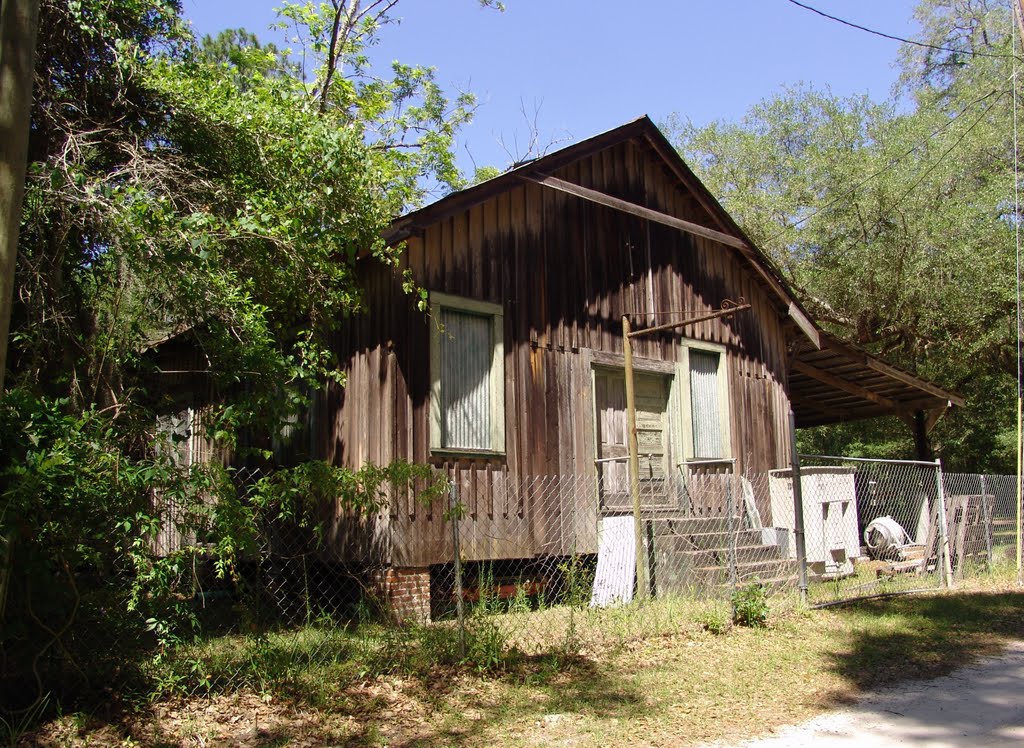 weathered wood building, once used as church, railroad once ran next to it (4-30-2011)