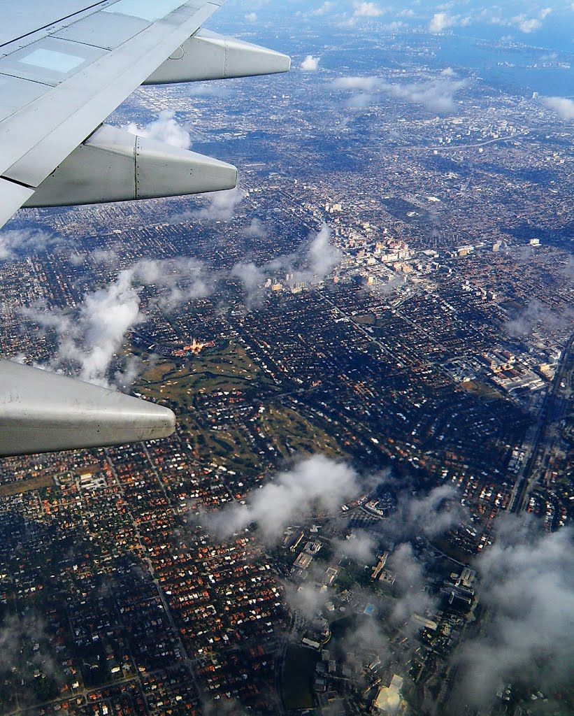 Overhead Miami South, DIXIE Highway...Coral Gables...Clear visible the Biltmore Hotel with the surrounding golgcourse, and to the east ,amongst others , The ALHAMBRA PLAZA