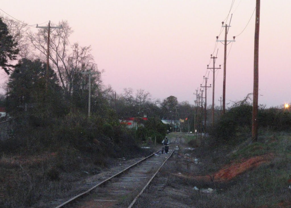 Walking along the railroad tracks