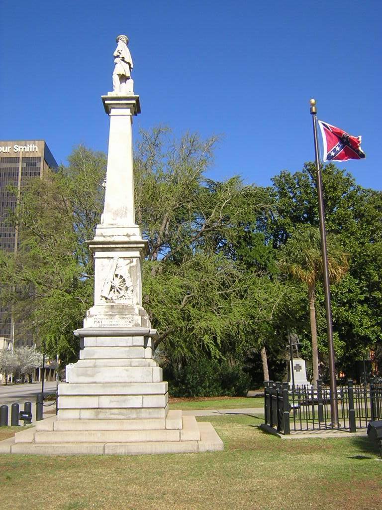 Statue & Flag In Front Of The SC Statehouse