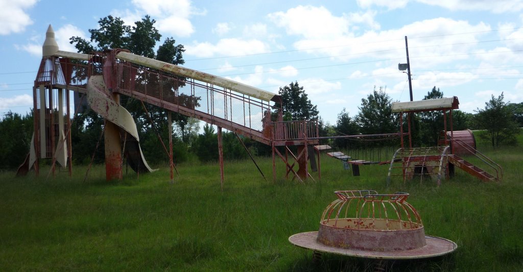 Abandoned Family Inns of America, steel play structure, Rowland, North Carolina.
