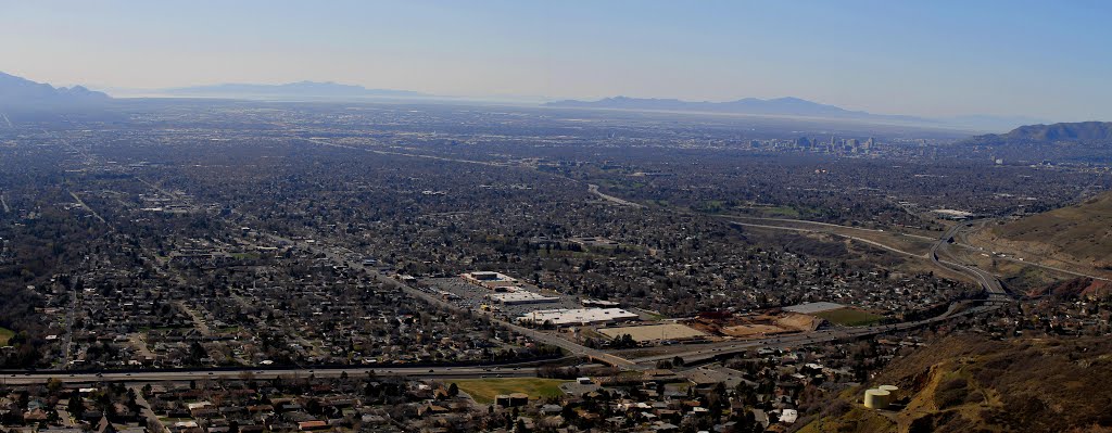 NW view - this is 1/10 of the Salt Lake valley. Far back are Stansbury and Antelope islands in Great Salt Lake. Downtown is at right and in front is I-215  east bound. - Enlarge please