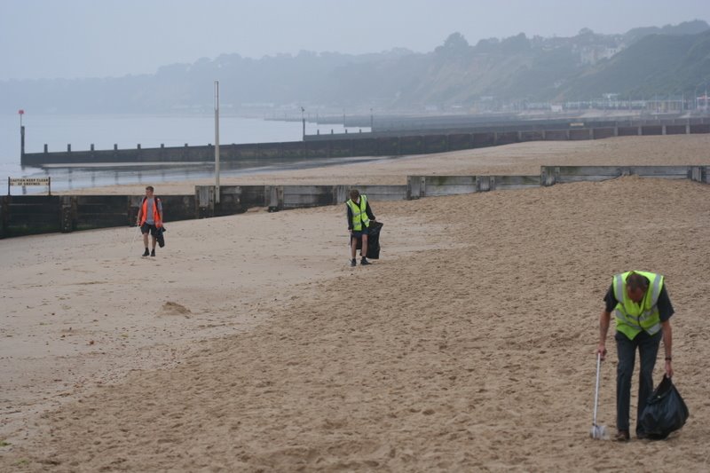 The morning after - beach cleaning in progress