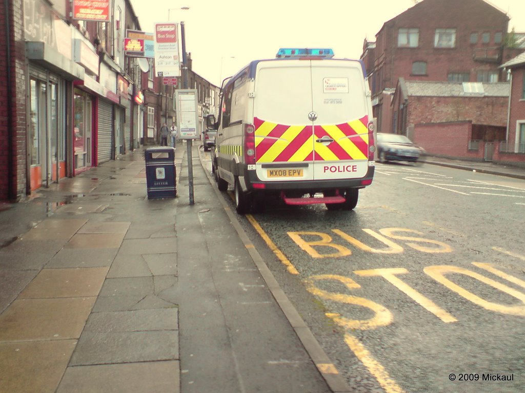 Police Van Parked at Bus Stop while Officers Buy Kebabs, Stockport Road, Ashton Under Lyne, Lancashire, England. UK