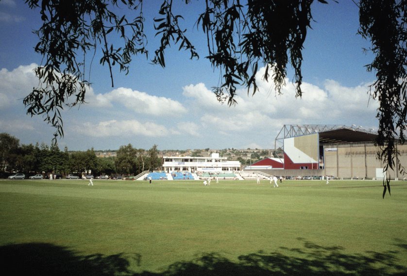 Burnley C C & Turf Moor in back ground