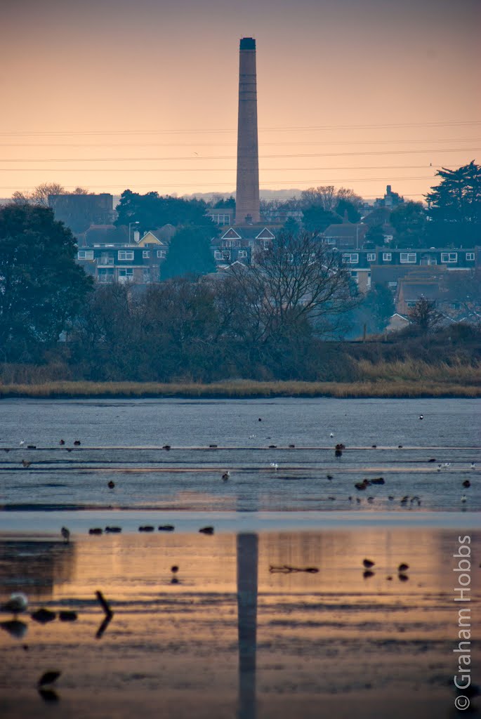 Crown Caps chimney from across Holes Bay