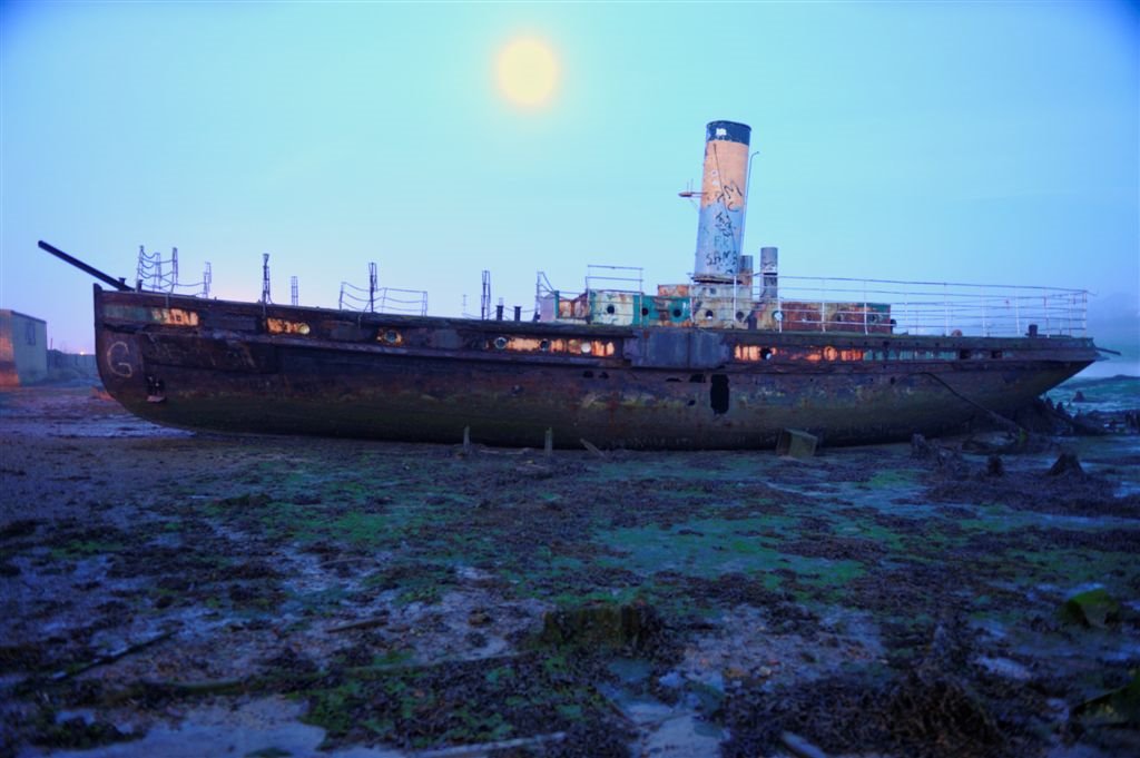 Boat and Moon at dawn