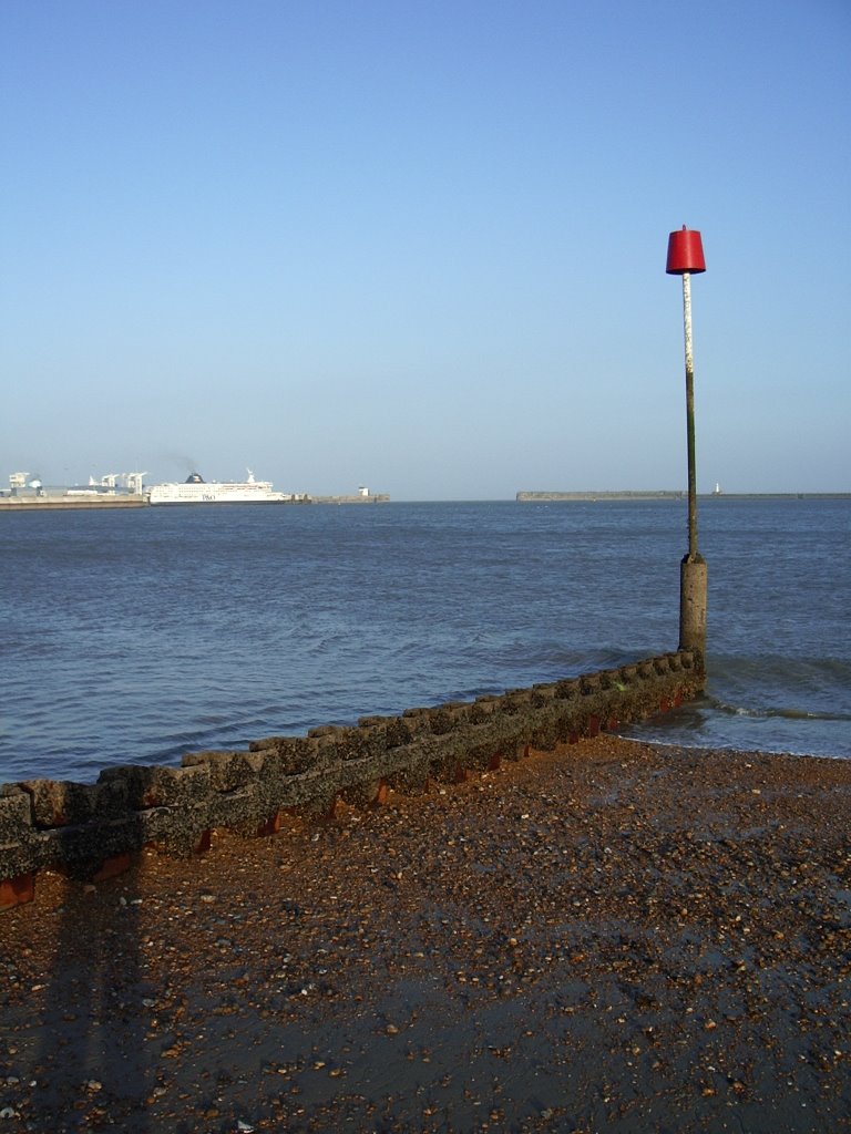 English Channel Ferry leaving Port, Dover Harbour Beach, Kent, United Kingdom