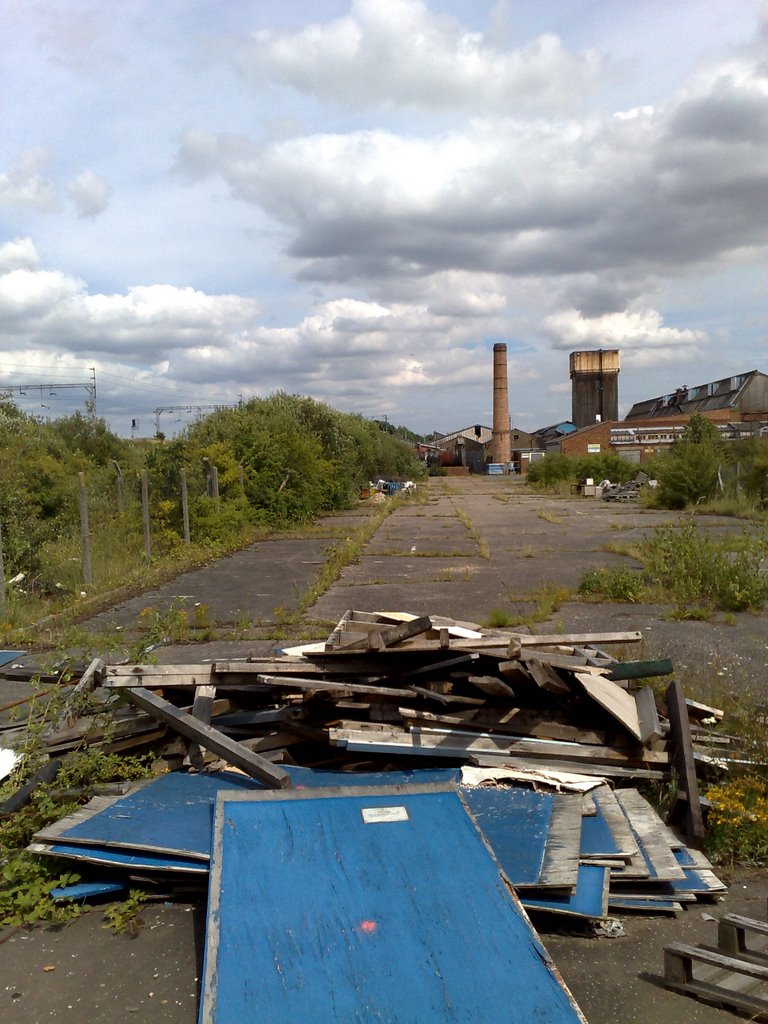 Peeking through the fence at the old Cowdray Industrial Estate